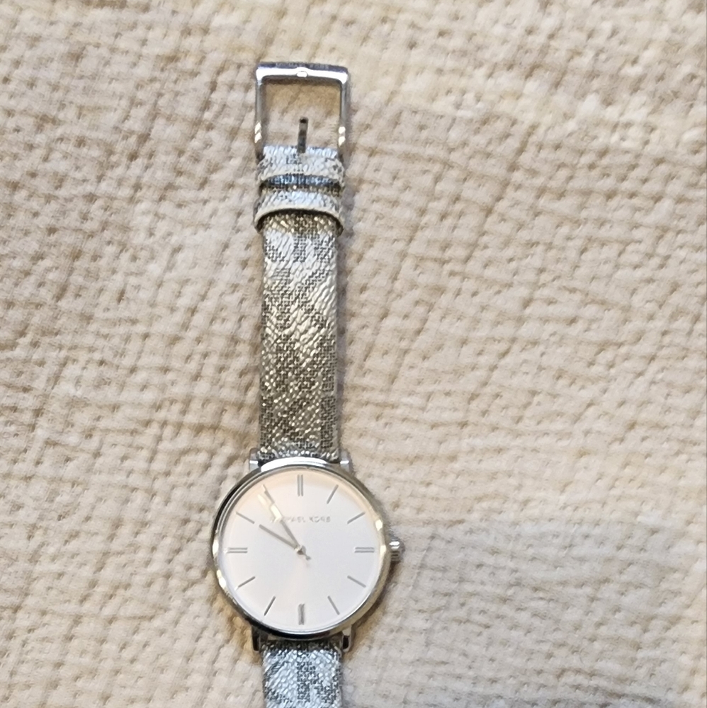 Micheal Kors silver watcg